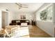 Spacious living room featuring a leather sectional and large windows at 6740 N 7Th St, Phoenix, AZ 85014