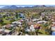 Aerial view of homes near mountains and golf course at 7258 E Manzanita Dr, Scottsdale, AZ 85258