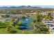 Aerial view of community with lake and fountain at 7258 E Manzanita Dr, Scottsdale, AZ 85258