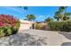 Front view of a single-story home with attached garage and landscaped yard at 7258 E Manzanita Dr, Scottsdale, AZ 85258