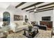 Living room features a fireplace, high ceilings, and lots of natural light at 7258 E Manzanita Dr, Scottsdale, AZ 85258