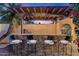 Al fresco dining with built-in grill and seating at 7258 E Manzanita Dr, Scottsdale, AZ 85258