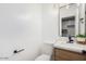 Modern bathroom with floating vanity and sleek fixtures at 7827 W Cypress St, Phoenix, AZ 85035