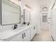 Modern bathroom with double vanity and contemporary lighting at 7827 W Cypress St, Phoenix, AZ 85035