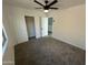 Bedroom with walk-in closet and carpet at 7827 W Cypress St, Phoenix, AZ 85035