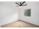 Bright bedroom with ceiling fan and window at 7827 W Cypress St, Phoenix, AZ 85035