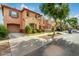 Two-story home on a tree-lined street with a driveway at 7827 W Cypress St, Phoenix, AZ 85035