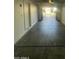 Attached garage with concrete floor and access door at 7827 W Cypress St, Phoenix, AZ 85035