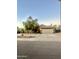 Two-car garage and mature trees in front at 7870 W Cheryl Dr, Peoria, AZ 85345