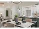 Modern kitchen island with marble countertop and breakfast bar seating at 7870 W Cheryl Dr, Peoria, AZ 85345