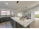 Large kitchen island with marble countertop and wine cooler at 7870 W Cheryl Dr, Peoria, AZ 85345