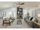 Modern living room features a fireplace and stylish furnishings at 7870 W Cheryl Dr, Peoria, AZ 85345