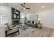 Living room with fireplace, large windows, and stylish seating at 7870 W Cheryl Dr, Peoria, AZ 85345