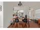 Dining area with wood table and chairs at 8020 E Thomas Rd # 330, Scottsdale, AZ 85251