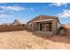 Expansive backyard showing the home's patio and ample space for landscaping and recreation at 8333 N 54Th Ln, Glendale, AZ 85302