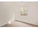 Bright bedroom with a window providing natural light and neutral carpet at 8333 N 54Th Ln, Glendale, AZ 85302