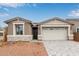 Charming single-Gathering home with stone accents, an attached garage, and a well-maintained walkway at 8333 N 54Th Ln, Glendale, AZ 85302