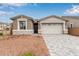 Charming single-story home with a two-car garage and desert landscaping at 8333 N 54Th Ln, Glendale, AZ 85302