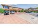 View of shops and parking lot at a shopping center at 8602 E San Alfredo Dr, Scottsdale, AZ 85258