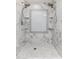 Updated shower with marble tile and double shower heads at 8602 E San Alfredo Dr, Scottsdale, AZ 85258