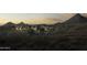 Luxury home nestled in mountains; expansive property with desert landscaping at 10784 E Pinnacle Peak Rd, Scottsdale, AZ 85255