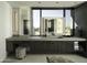 Modern bathroom with double vanity, large window, and a view at 10784 E Pinnacle Peak Rd, Scottsdale, AZ 85255