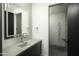 Elegant bathroom with floating vanity and shower at 10784 E Pinnacle Peak Rd, Scottsdale, AZ 85255