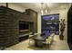 Modern dining room with dark wood table and chairs, offering scenic views at 10784 E Pinnacle Peak Rd, Scottsdale, AZ 85255