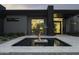Modern entryway with water feature, & dark brick at 10784 E Pinnacle Peak Rd, Scottsdale, AZ 85255