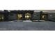 Modern home's exterior features a courtyard & brick driveway at 10784 E Pinnacle Peak Rd, Scottsdale, AZ 85255