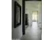 Bright hallway with large artwork and modern flooring at 10784 E Pinnacle Peak Rd, Scottsdale, AZ 85255