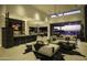 Open living space with sectional sofa and outdoor access at 10784 E Pinnacle Peak Rd, Scottsdale, AZ 85255