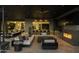 Luxury outdoor kitchen and lounge area with fireplace at 10784 E Pinnacle Peak Rd, Scottsdale, AZ 85255