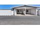 Front view of the house with carport and entrance at 10863 W Thunderbird Blvd, Sun City, AZ 85351