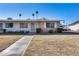 Single story home with brick facade and small front yard at 10863 W Thunderbird Blvd, Sun City, AZ 85351