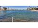 Scenic view of a lake with fountain and palm trees at 10863 W Thunderbird Blvd, Sun City, AZ 85351