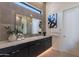 Modern bathroom with a large vanity, walk-in shower, and soaking tub at 11972 E Yearling Rd # 20, Scottsdale, AZ 85255