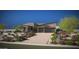 Stunning desert home with modern architecture, two-car garage, and colorful xeriscaped front yard at 11972 E Yearling Rd # 20, Scottsdale, AZ 85255