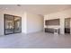 Spacious game room with wet bar, wine cooler, and access to patio at 11972 E Yearling Rd # 20, Scottsdale, AZ 85255