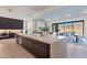 Modern kitchen with large island and high-end appliances at 11972 E Yearling Rd # 20, Scottsdale, AZ 85255