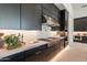 Modern kitchen with stainless steel appliances and marble countertops at 11972 E Yearling Rd # 20, Scottsdale, AZ 85255