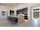 Sleek kitchen with dark cabinetry, marble counters and high end appliances at 11972 E Yearling Rd # 20, Scottsdale, AZ 85255