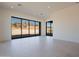 Spacious living area with large windows and sliding glass doors at 11972 E Yearling Rd # 20, Scottsdale, AZ 85255