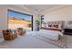 Spacious main bedroom with sliding glass doors leading to the backyard at 11972 E Yearling Rd # 20, Scottsdale, AZ 85255