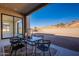 Covered patio with seating area and mountain views at 11972 E Yearling Rd # 20, Scottsdale, AZ 85255
