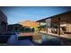Swimming pool with outdoor kitchen and waterfall features with mountain views at 11972 E Yearling Rd # 20, Scottsdale, AZ 85255
