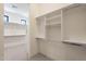 Spacious walk-in closet with ample shelving and hanging space at 11972 E Yearling Rd # 20, Scottsdale, AZ 85255