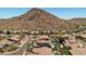 Aerial view of homes nestled in a mountain community at 14035 E Sahuaro Dr, Scottsdale, AZ 85259