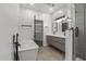 Elegant bathroom with double vanity and soaking tub at 14035 E Sahuaro Dr, Scottsdale, AZ 85259