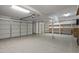 Two-car garage with storage shelving at 14035 E Sahuaro Dr, Scottsdale, AZ 85259